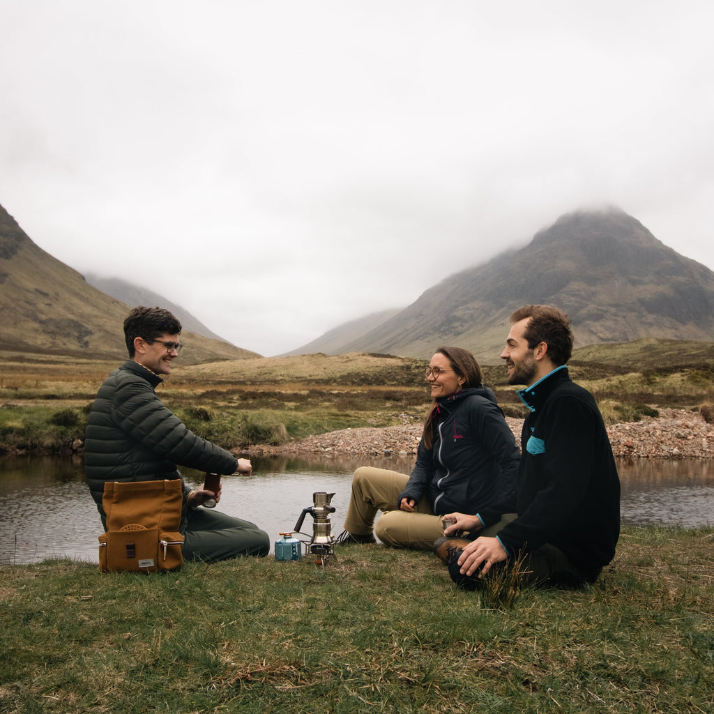 Three people enjoying espresso from 9Barista